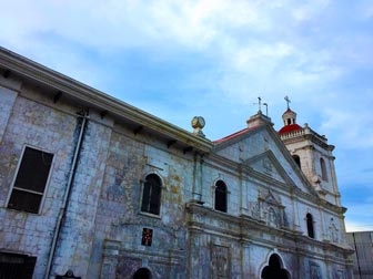 Nurse Prays for Patient at Basilica del Santo Nino