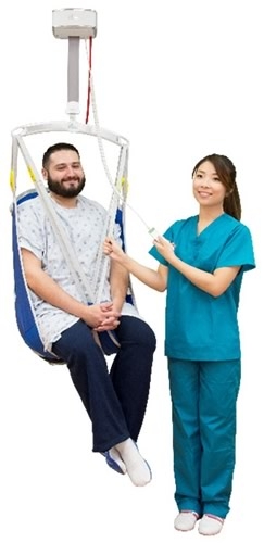 Nurse lifting patient