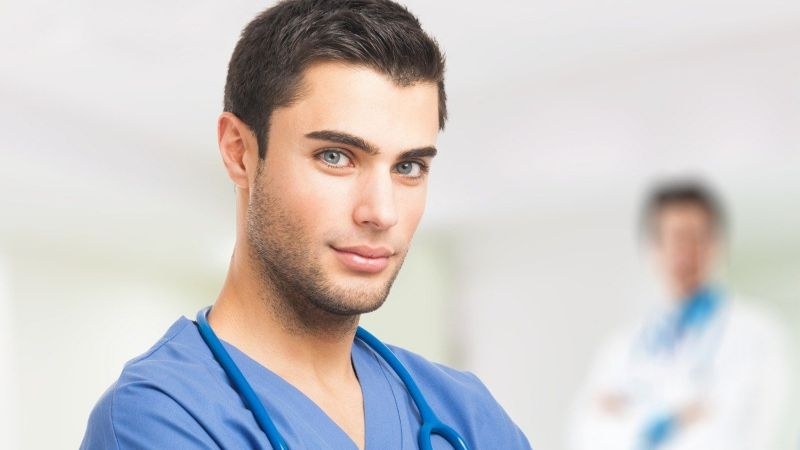 Nursing student in scrubs at a clinical site, representing nursing schools in St. Louis.