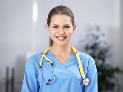 Nursing student enrolled in one of the best BSN programs in Missouri, wearing scrubs and a stethoscope.
