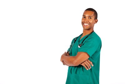 Smiling nursing student in scrubs representing a nursing program in Florida.