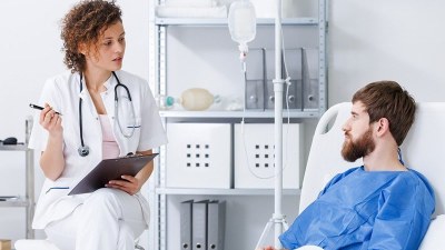 PMHNP student practicing clinical skills with a patient, enrolled in one of the shortest PMHNP programs.